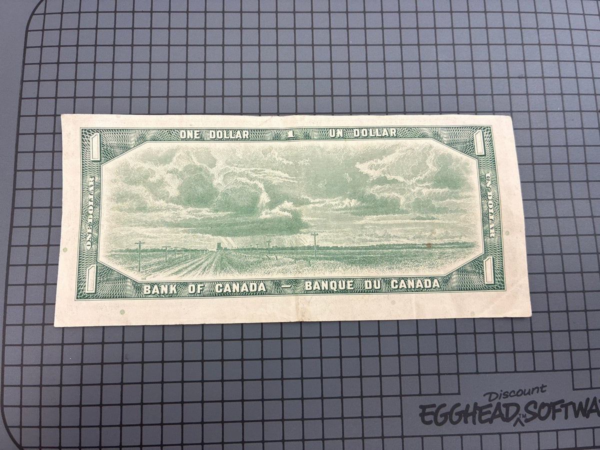 🔥 Bank of Canada 1954 $1 Devil's Face Note - CF7330729 Beattie-Rasminsky
