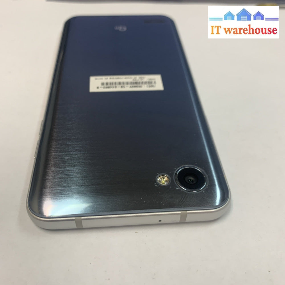 Nice ~ LG LG-M703 Q6 32GB Cell phone- Silver- (Carrier: Fido, Rogers)