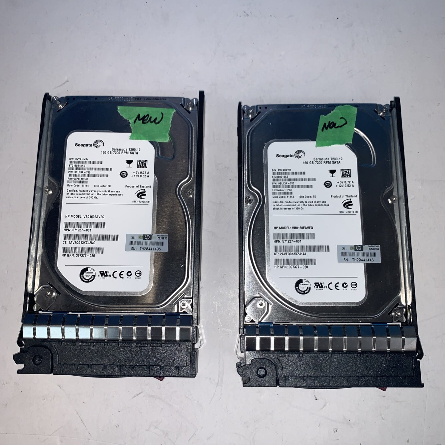 New ~ Lot Of 2 HP ST3160318AS. VBO160EAVEQ 9SL13A-780 HPGO 11144 Tk Hard Drive