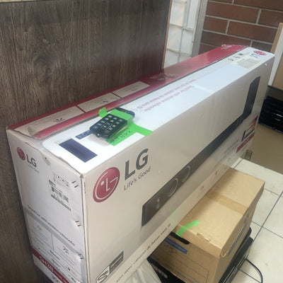 LG SH3B soundbar /w subwoofer and  Remote.