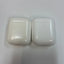 Lot of 2 Apple AirPods Lightning Charging Cases with one earbud