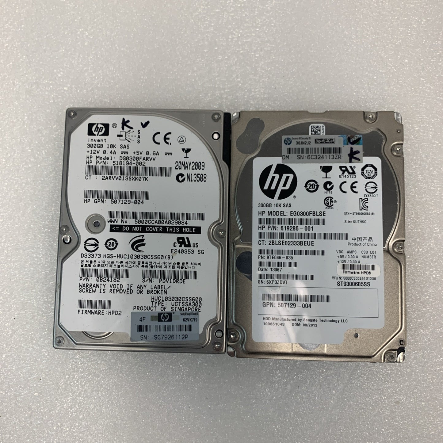 Lot of 2 HP 300GB 10K SAS 2.5"  server hard drives （1000 days remaining life）