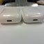 Lot of 2 Apple AirPods Lightning Charging Cases with one earbud