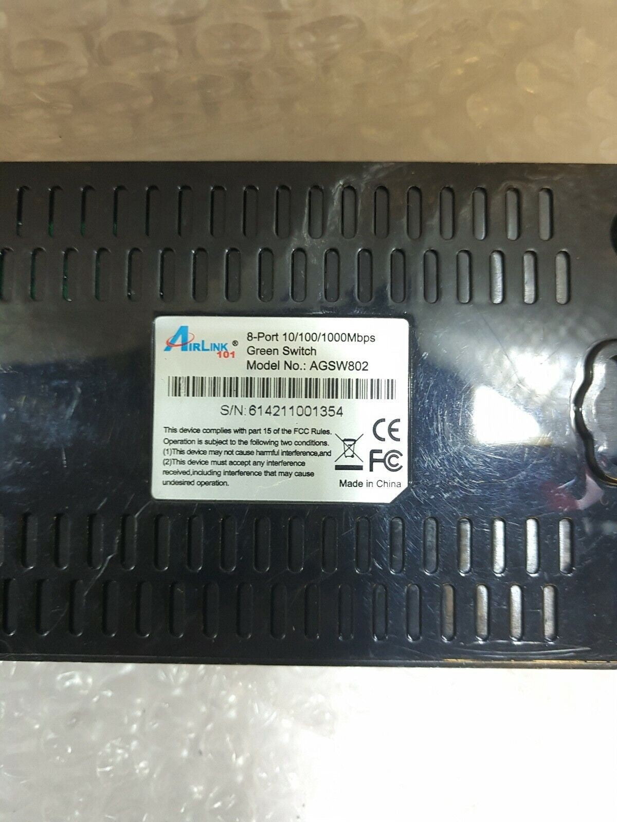 - AirLink 101 8-port 10/100/1000  Green Switch AGSW802 WITH 9V AC ADAPTER