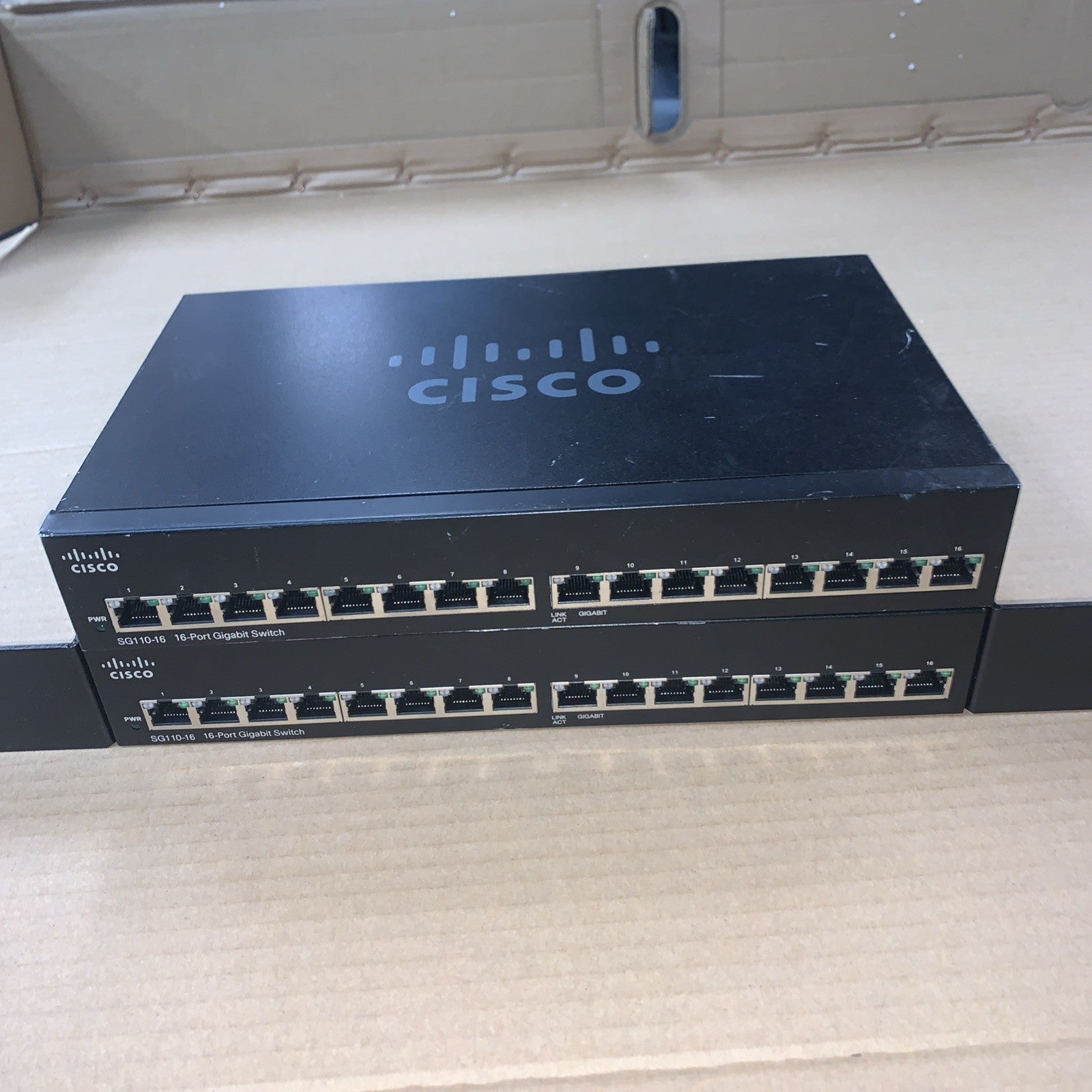Lot of 2 Cisco SG110-16 16 Gigabit Ethernet GbE Ports network Switch