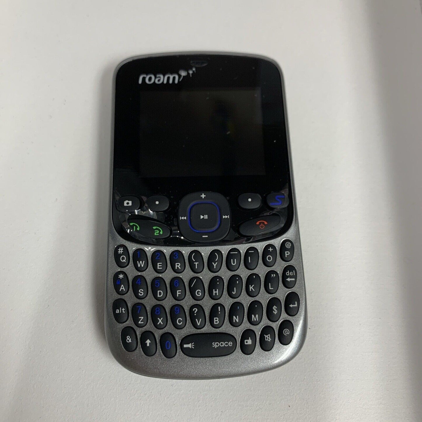 （New, no battery)  Roam Mobility Breeze Travel Phone (unlocked)