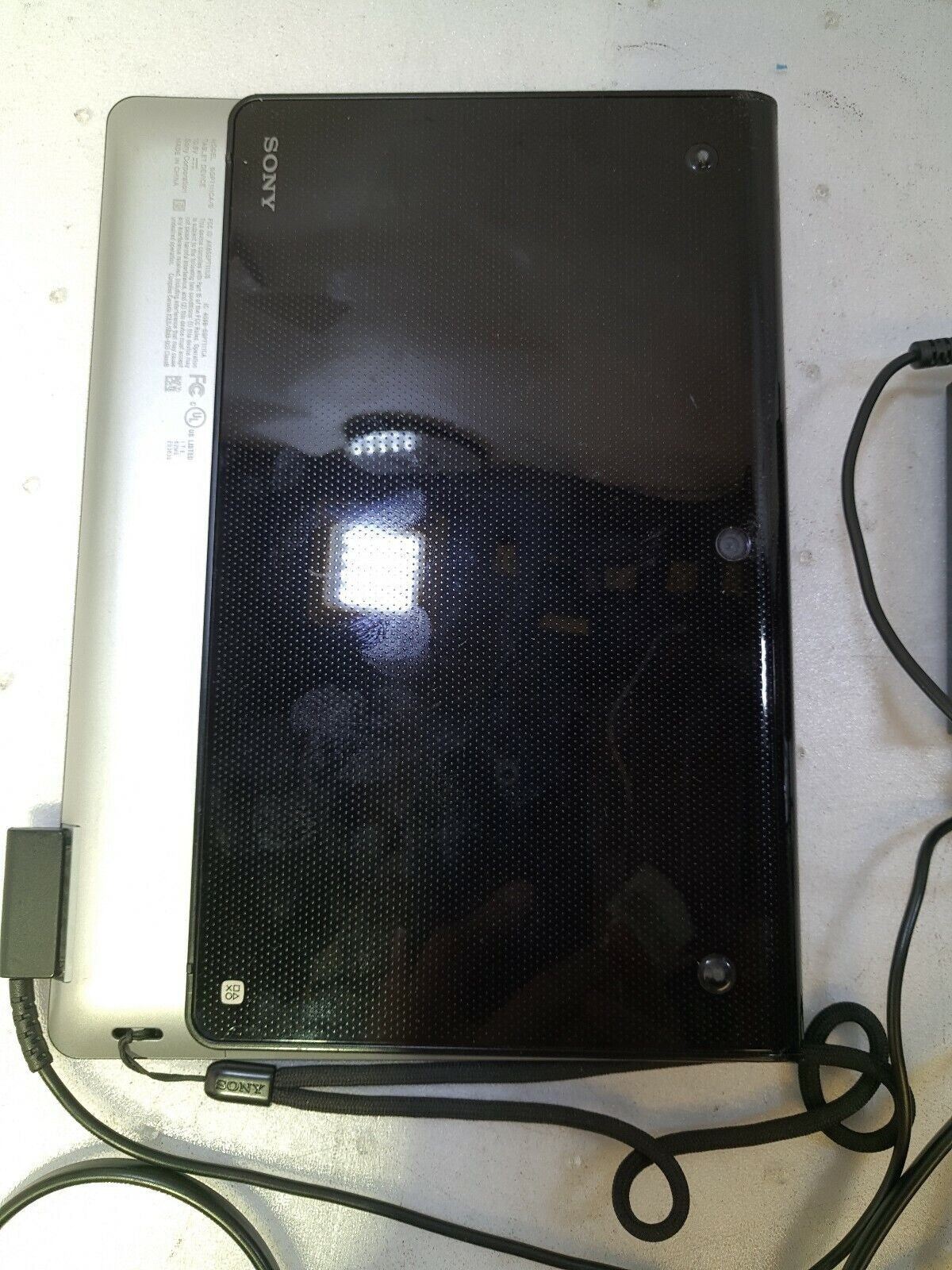 - SONY TABLET DEVICE SGPT111CA/S  WIFI 9.4" BLACK ANDROID W/ADAPTER (FOR PARTS)
