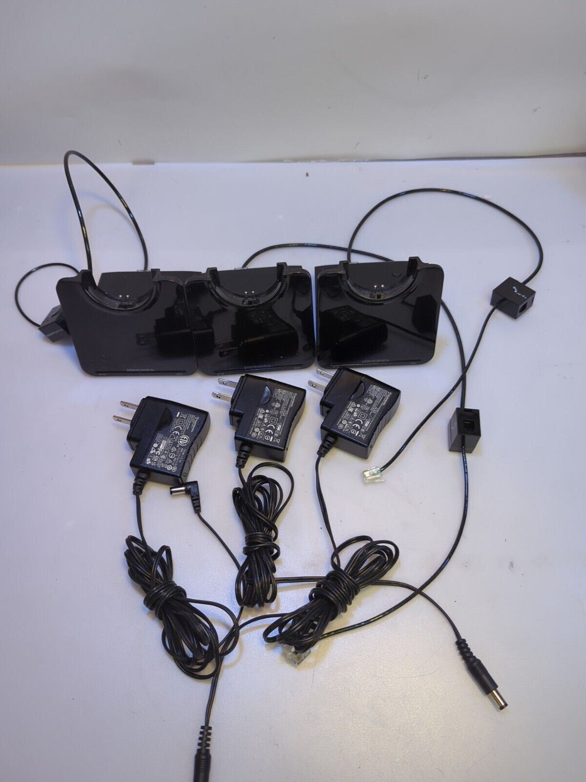 - 3x sets of Plantronics Wireless Headset CS520 C052 charging base with cables