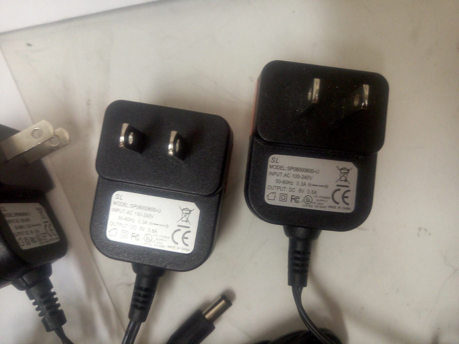- LOT OF 4 SL SP08000600-U AC ADAPTER  OUTPUT: DC 8V 0.6A