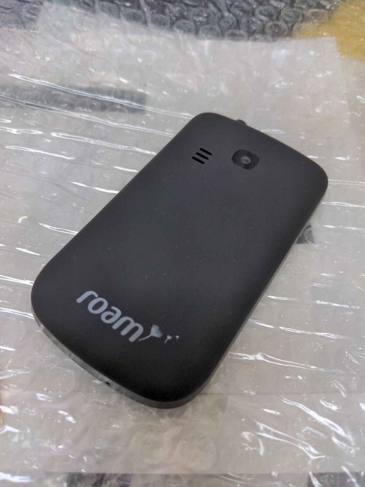 （New, no battery)  Roam Mobility Breeze Dual SIM Cards Travel Phone (unlocked)