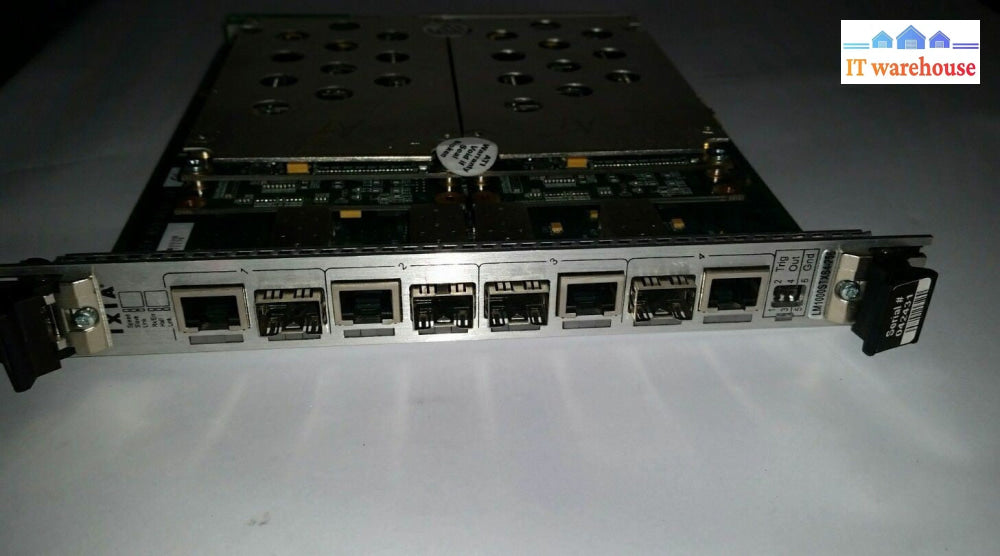 IXIA LM1000STXS4-256 10/100/1000 MBPS & GIGABIT ETHERNET TXS LOAD MODULE.