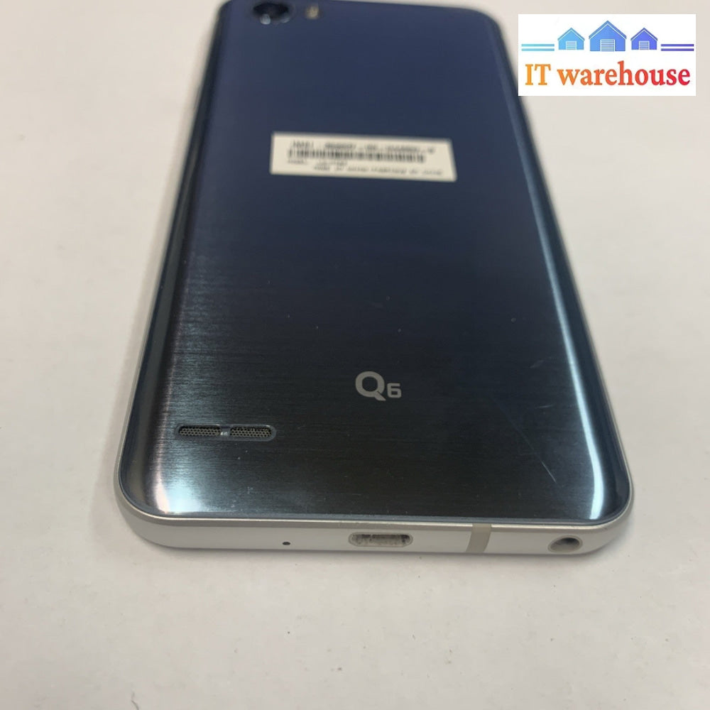 Nice ~ LG LG-M703 Q6 32GB Cell phone- Silver-  (Carrier: Fido, Rogers)