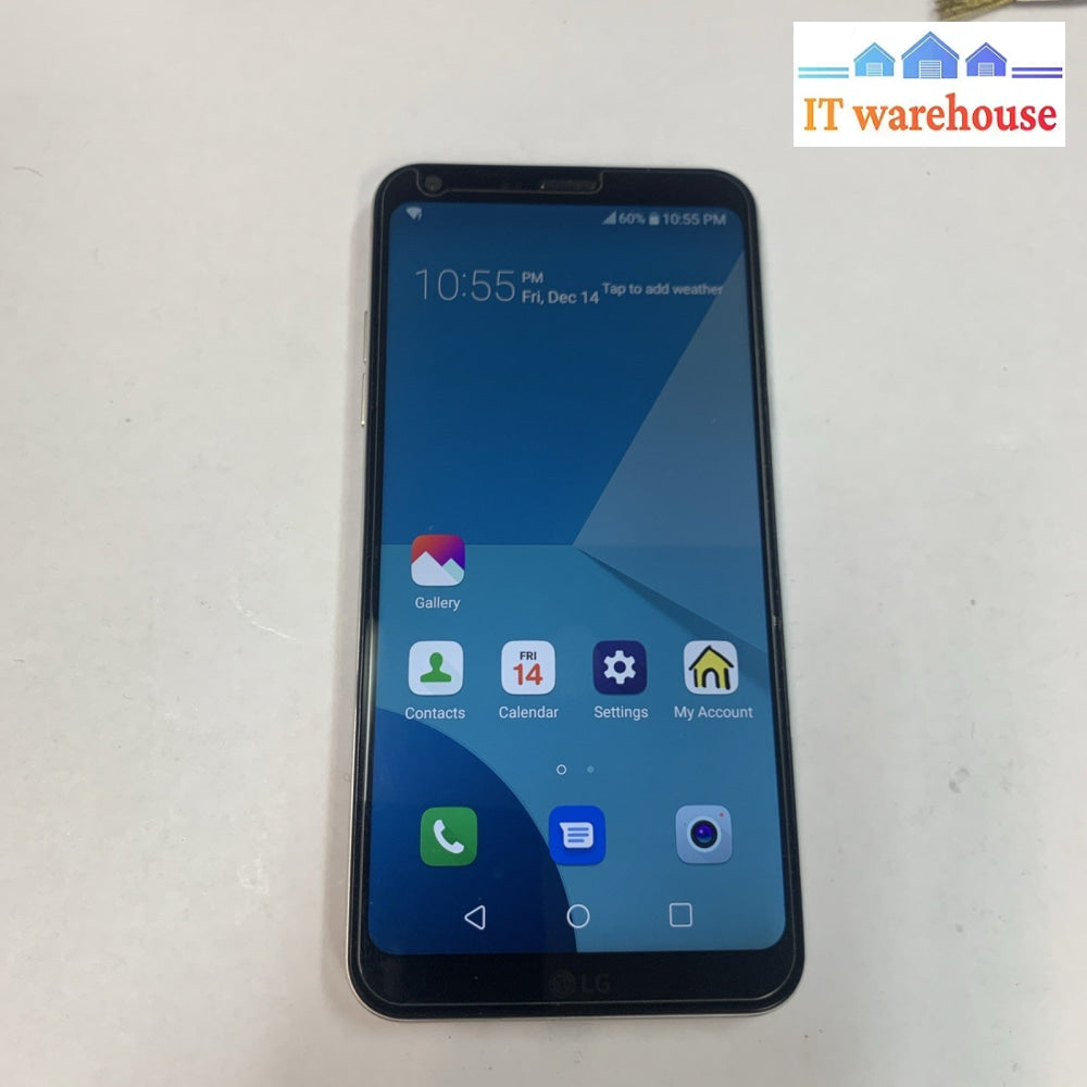 Nice ~ LG LG-M703 Q6 32GB Cell phone- Silver-  (Carrier: Fido, Rogers)