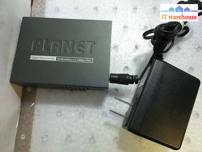 - Planet GT-805A 10/100/1000 Gigabit Ethernet Fiber Bridge W/AC Tested